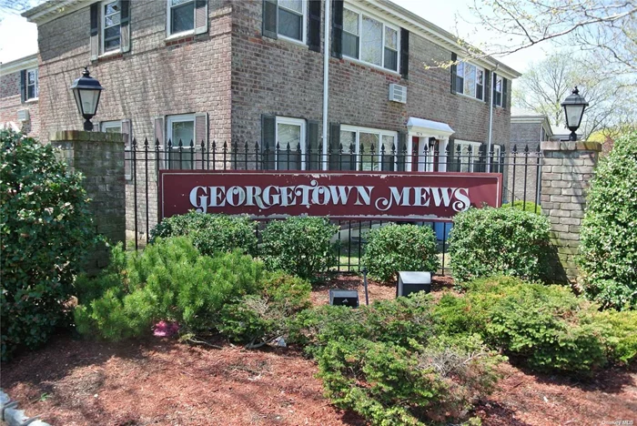 Spacious 1 Bedroom lower level, Georgetown Mews Flushing. 1 Bedroom, large living room + dining,  kitchen, stainless steel appliances, dishwasher, stove, refrigerator.