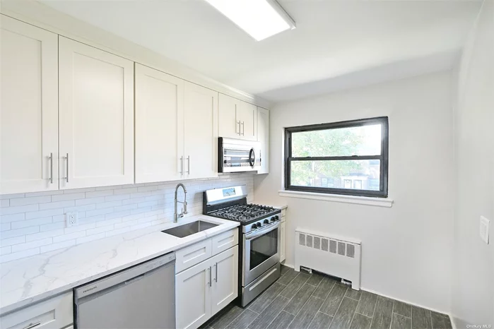 COMPLETELY RENOVATED & BEAUTIFUL -2 BDRM UPPER LEVEL. NEW KITCHEN NEW APPLIANCES, NEW BATH . GLEAMING HARDWOOD FLOORS, NEW ELECTRICAL PANEL, PET FRIENDLY. WALKING DISTANCE TO SUPERMARKET, SHOPS & ALLEY POND PARK & CUNNINGHAM PARK. ALL TAXES AND UTILITIES INCLUDED IN MAINTENANCE EXCEPT ELECTRIC. CAN SUBLET AFTER 1 YEAR.NO FLIP TAX. WILL SELL FAST MUST SEE