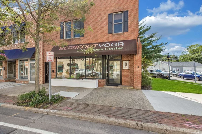 First Floor 2310 Sq Ft of Open Space/Reception Area/Office/Bath Plus 2 Car Garage In Back 600 Sq Ft. Great Exposure, 8 Parking Spots and Street Side Parking.