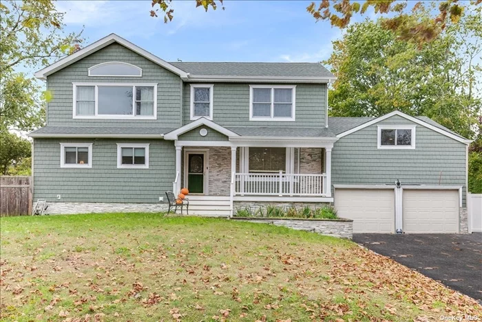 No Stone left Unturned in this beautifully appointed 6 bedroom, 4.5 bathroom Colonial located on a cul-de-sac. Step up onto the front porch, through the entry door to a great Open floorplan. The Eat-in-kitchen has all top-of-the-line finishes and separate wet-bar. The main level consists of wide-plank oak flooring. Down the hall is the first of 2 Master Suites along with 2 other bedrooms and full bath. Head up half a flight to enter the oversized living room perfect for entertaining. The bamboo floor laid second level is comprised of 2 guest bedrooms, fully renovated bathroom, and office nook leading to the oversized 2nd Primary Suite with 2 walk-in closets and a gorgeous bathroom with walk-in room for both shower and custom bathtub. Retreat to your private backyard oasis with in-ground pool, fire-pit and flat greenery for activities. Half Hollow Hills SD #5.