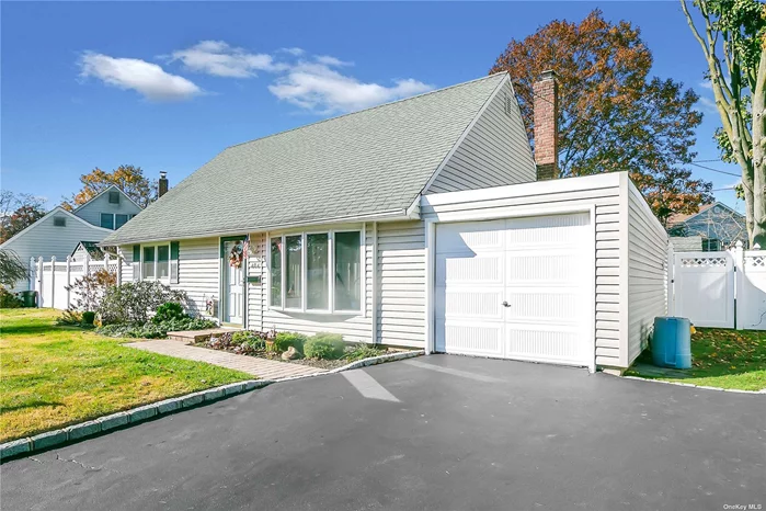 Beautiful wideline Cape situated on quiet mid-block in the heart of Bethpage, great curb appeal w/ newer vinyl sided exterior, new double blacktop driveway w/ Belgium blocks, newer brick paver walkway & stoop, LR w/ vaulted ceiling, DR w/ sliding Andersen doors to patio, kitchen w/ oak cabinets, ceramic tile backsplash, new stove & hi hats. Ceramic tile Fbth, MBR w/ new laminate floor & ceiling fan. All windows have been replaced, verticals, blinds, newly painted interior, heating system approx. 15 years old, brand new 275 gallon above ground oil tank, 100 amp electric, 1 car attached garage w/ an attached laundry rm w/ washer & dryer. Privately fenced backyard, 6 ft PVC fencing, patio, shed, beautiful landscaping, convenient to all transportation & shopping.