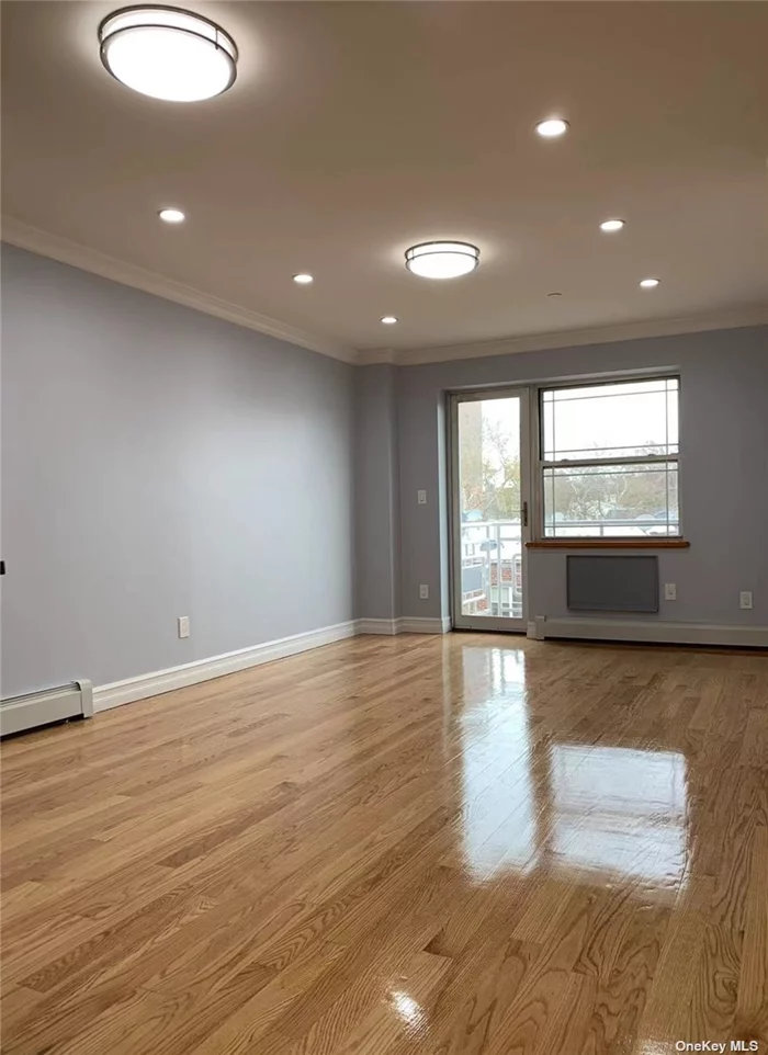 Woodside newly renovated 2-bedroom and 2-bath condo in elevator building. Features two balconies, in unit washer and dryer, new kitchen, new floor. Conveniently located minutes from #7 train, buses, supermarkets, shops and restaurants on Roosevelt Ave.