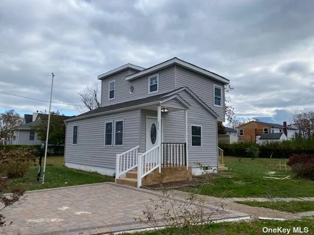 Beutifully Completly Renovated Three Bedroom, Two Bath Home. Short Distance To Smith Point County Park And Brokkhaven Town Beach On Bellport Bay. A Great Plce To Live. W/D, One Car Detahed Garage With Extra Storage.