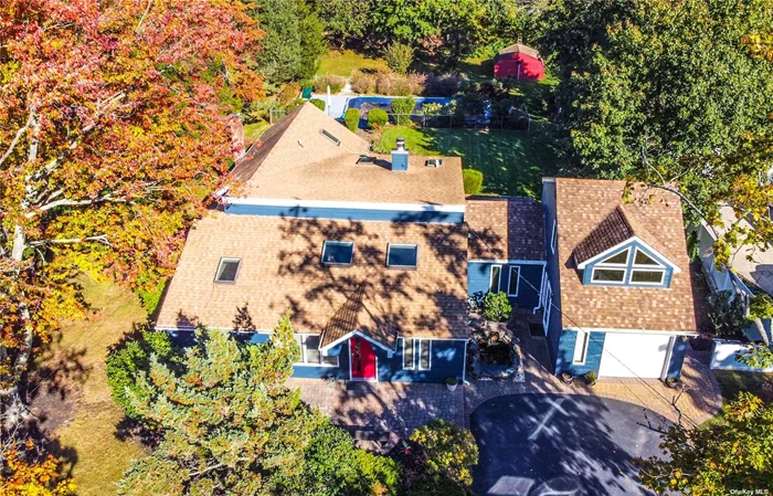 Lovely gem in Smithtown, owned by the same Family for 30 + Years. Plenty of open space for entertainment, including a double-sided fireplace and heated pool. Walk into the high vaulted ceilings with sky lights and beautiful natural hardwood floors throughout (except for the 2nd floor Bedroom), your perfect master bedroom Suite, a great size Finished Basement and lots of closet space. The home has an extension that can be used as a private office or Mother-Daughter Suite with proper permits. The property sits on 0.6 acre that boarders nature preserve. With great roots and foundation the home is ready for new owners to make it their own.