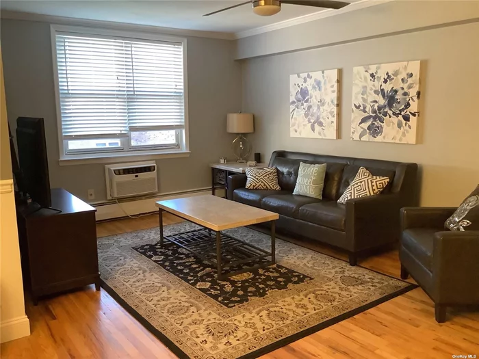 Spacious unit in elevator building. Laundry on first floor. Unit is tastefully updated with custom moldings, walk in closets. Maintenance without Star. $50.00 parking fee.