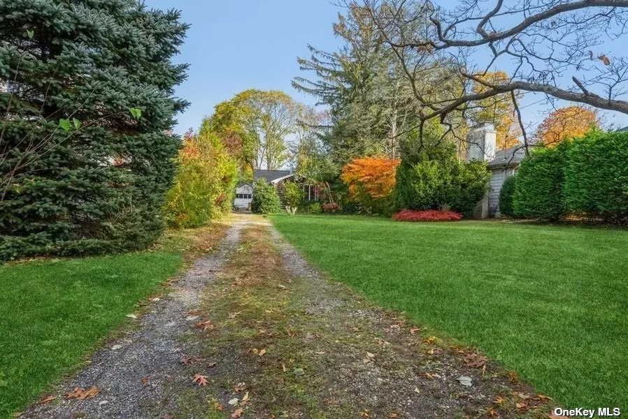 Calling all builders and buyers looking for a project to build new or renovate. Wonderful opportunity to purchase 50 x 226 property in sought-after location in the Syosset School District. House and garage being sold in As Is condition with no representation on the house, garage or systems.