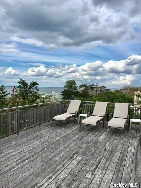 Fabulous Home With Gorgeous Views Of The Bay, New Pergola Area Great For Entertaining. Includes Outside Shower, Handicap Access, Heat, A/C, 8 Bikes, 12 Beach Chairs, Beach Umbrella, and Wagon.