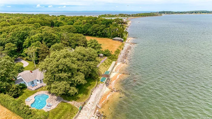 BOOK &rsquo;24 NOW: Various Rates All Year Long: East Marion, North Fork - Coveted and rare rental (Rates: Season 2023 $87k; June $20k, Aug-LD $40k; Bal of Sept OR Oct $20k; off Season Winter $7000 per mo etc) on the bay in private setting overlooking Bug Light and Long Beach. Spectacular setting with heated, waterside pool. One floor living with many access points to southeast facing deck/terrace. Incredible sunrises - and sunsets reflected on the lighthouse and bay. Living room w/fireplace, sunroom/office, EIK with upscale appliances; DR w/sliders to terrace for outdoor dining. Waterside master suite w/full bath, 3 additional bedrooms w/guest bath. Large 3+ car garage for cars and summer toys. Private yard space for playing and pique-nique&rsquo;ng. The ultimate North Fork beach house rental for you and your guests. Home sleeps up to 12 people comfortably.  Life doesn&rsquo;t get better than at Tara-by-the-Bay. Close proximity to area farmstands, lavender fields, wineries and destination restaurants in Greenport. Permit #0248.