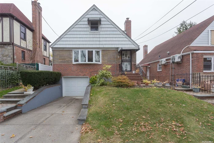 Gorgeous brick Two-family house in Bayside NY. Full finished basement with a separate entrance, the first floor has two bedrooms, a full bathroom, a living room, dining room, and a kitchen. The second floor has a one-bedroom apartment, living room, and an eating kitchen. There is a French drainer install in the basement. The house has hardwood floors, was recently waterproofed, and has a spacious backyard. close to major highways, public transportation and the LIRR