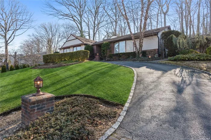 Roslyn. Beautiful newly renovated 3 bedroom, 3 bath in the heart of Country Estates in East Hills. As you walk into this beautiful home you enter a large living and dining area which wraps around the eat-in kitchen and den. Updated stove top, stainless steel appliances and microwave. Mud room, cedar closets and two-car garage. Full finished basement with extra room. Circular driveway, huge patio/deck for entertainment. Access to East Hills Park/Pool.