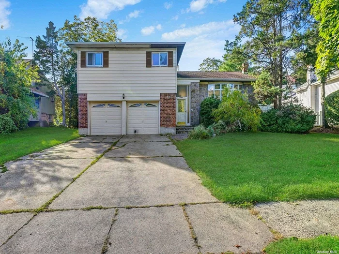 Welcome to this Split Level Home located in Jericho. The house boast 3 Bedrooms and 2 Bathrooms. Key features include Huge Living Room, Eat-in Kitchen, Formal Dining Room, Master Bedroom Suite, Full Basement, 2 Car Garage, Hardwood Floors and Jericho School District.