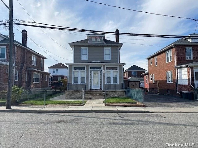 Great legal 2 family with garage and backyard space. First floor boasts 2 bedrooms, full bath, large formal living room. Second floor has 3 bedrooms one is tandem with living and dining area. Plenty of attic storage too. House boasts newer roof, electric and heating system. Come make a deal.