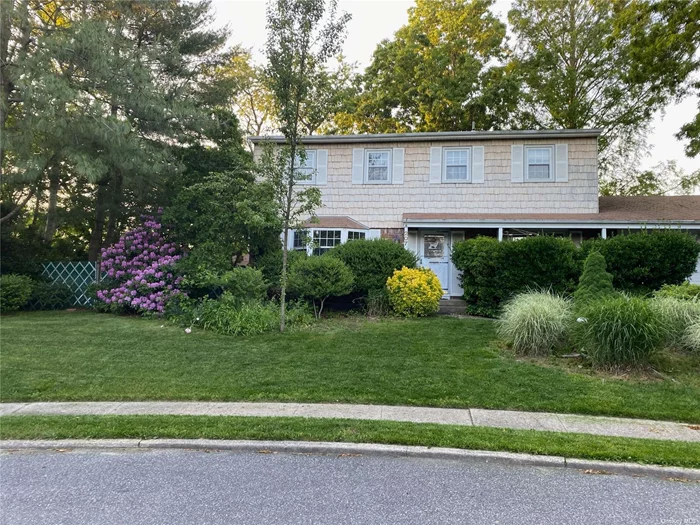 spacious Center hall colonial, 4 bedrooms, 2.5 baths, full basement, hardwood floors throughout, solid well maintained home needs updating and new life, last home in culdesac, neighborhood has sidewalks, Sachem schools, close to LIRR, LI expressway, Sunrise Hwy, shooping, etc.