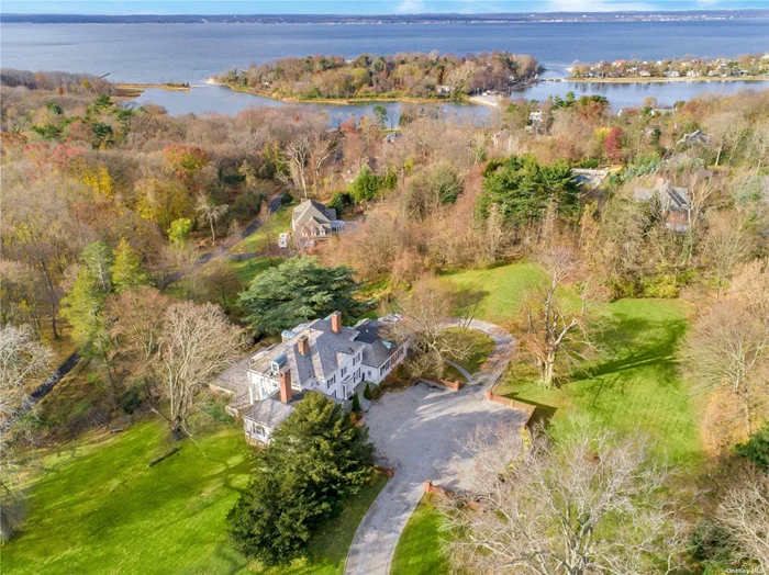 Rare Opportunity To Own An Updated Historic North Shore Mansion As Your Main Residence Or Country Home. Originally Built for Lydia Pratt In 1888, This Georgian-Style Colonial Offers An Elegance And Grandeur Of A Bygone Era With The Luxuries And Amenities Of Today. Three Levels Of Beautifully Designed Interiors Completed By Top Designers In 2013, With Finishes By Artistic Tile, Farrow & Ball, Scalamandre, Stark & de Gournay, To Name A Few. Exquisite Mantels Adorn 5 Fireplaces, Gourmet Eat-In Kitchen With La Cornue Range and Sub-Zero Refrigerator And Wine Cooler, Extensive Millwork, Original Hardwood Floors, Grand Circular Staircase, Guest/Staff Suite or Professional Office Suite, 10&rsquo; Ceilings, Banquet-Sized Formal Dining Room, Generator Transfer Switch, Updated Heating/CAC System, Full Basement, 3 Car Garage, And More. Additional Adjacent Acreage Available. Abuts The 200 Acre Welwyn Preserve And Other Notable Estates. Near Beaches, Preserves, Clubs and Golf. Immediate Occupancy.
