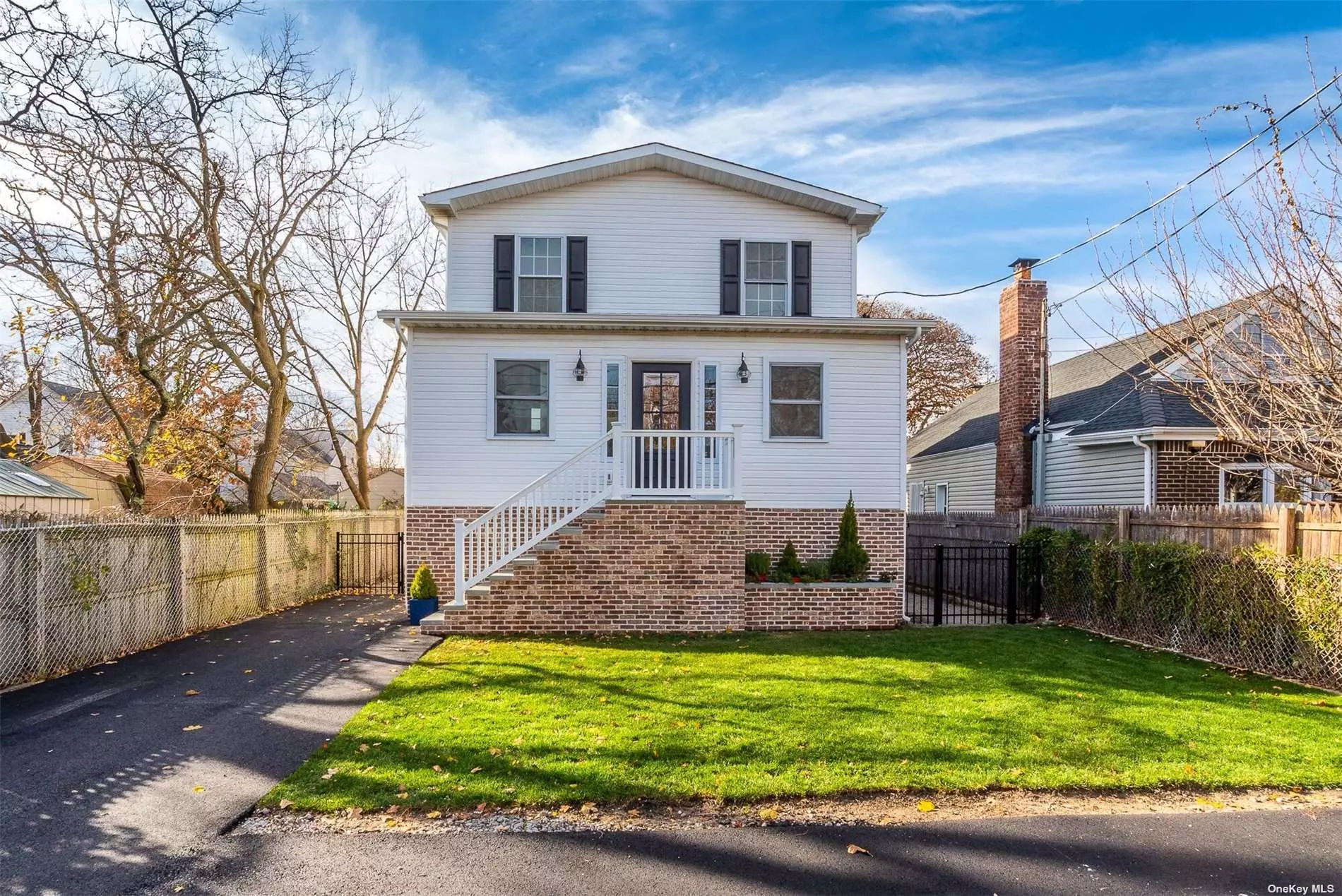 Enjoy beach community living in Bayville! This fully renovated 3BR/2.5Bth colonial is located at the end of a quiet street & just a stone&rsquo;s throw from the water. Built for easy entertaining, the main level features a brand new open concept dining room & eat-in kitchen with island, stainless steel appliances, quartz countertops & Christopher Peacock cabinetry. The first floor also offers a powder room, office/4thBR & sundrenched living room with new gas fireplace. The mudroom, with custom built-in bench & storage closets, provides access to a fenced in backyard & garage with ample storage. The 2nd level has 2 BRs, full bth, plus primary suite boasting an updated full bath w/ double sink vanity. New washer/dryer, plumbing, windows, CAC, electric, cesspool. Enjoy two village beaches, boat basin with docks, dog park, walking trails, tennis courts & beautiful sunsets. Within 40 miles from NYC. Low taxes. Flood zone. Locust Valley SD. *Some photos have been digitally staged*