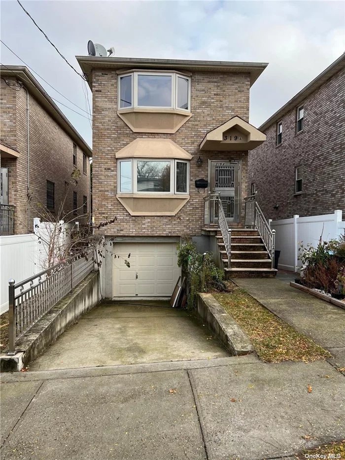 Detached Young brick one family house with finished basement and attached garage, private driveway.Well-maintained, move in condition. Central AC, hardwood floor, stainless appliances and much more.Zoned for PS 129 JHS194.