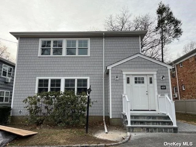 Completely Renovated Second Floor Apartment with Hardwood Floors, New Kitchen and Baths, New Windows, CAC, Washer/Dryer and Plenty of Storage Space in Large Basement Area. Shared Backyard, Each Side with its Own Stone Patio. Located on One of Manorhaven&rsquo;s Most Quiet Lanes and Convenient to Manorhaven Community Park, Beach and Pool.