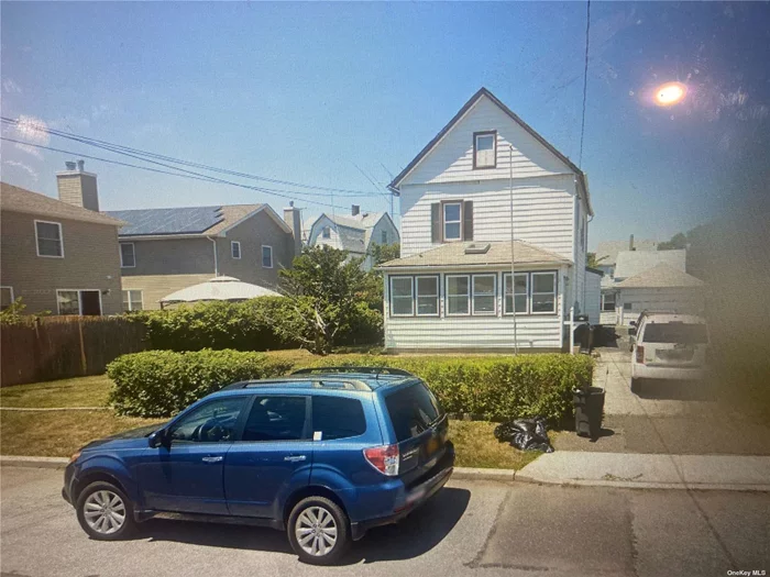 2 family in heart of woodmere vacant needs tlc close to schools and shopping