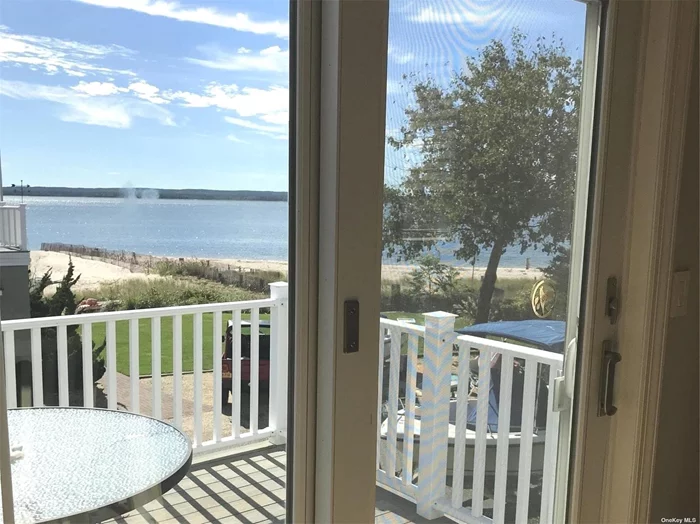 Private entrance leads up to this lovely apartment. Beautiful open LR/DR/Kit, 2 bedroom 1 Bth. Garage., Washer/Dryer, Heat included. Balcony overlooking Peconic Bay. A perfect North Fork place to rent off season or Md-Ld.