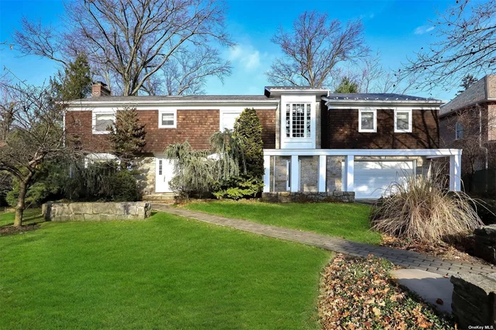 This house was expanded and renovated in 2001. It is located in the village of Kensington, with private police and pool, near to all shopping, restaurants and LIRR,  The home is post modern designed by renowned architect and boasts 5 full bedrooms upstairs PLUS a spectacular home office and sitting loft. The yard is flat and oversized (1/3 acre) and backs on Allenwood park.