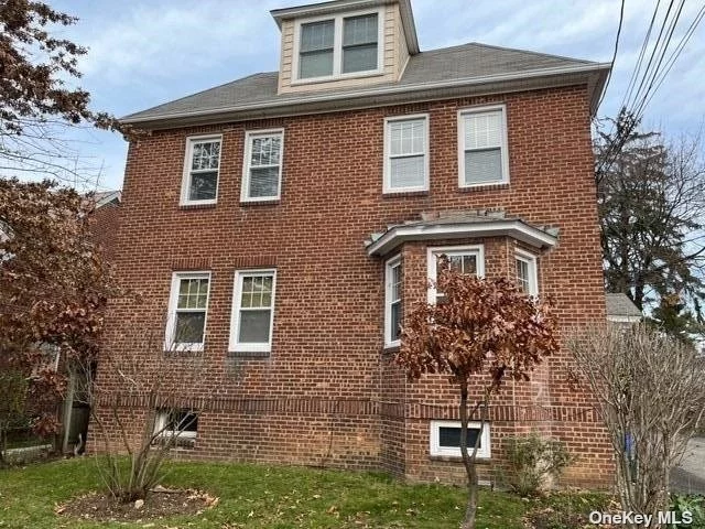 Second Floor 2 Bedroom Apartment w/ Hardwood Floors. LR and Dining Room are Not Contiguous; Rooms are Separate. Shared Basement Space with Laundry Hook-Up.