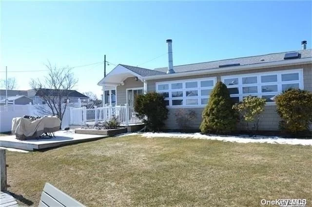 New to the MKT. 2 Bdrm/2 BTH Beautiful Waterfront property. Lovely front porch. Nicely updated Large Gourmet Kitchen/Stainless ST Appls. Hardwood flrs and crown molding thru out. One bdrm w fplc. WIC. Master bdrm w Steam Spa Shower/jacuzzi. LIV RM rm w fplc. Surround system. Great for those chilly nights. Possible slip available for the season. Open layout great for entertaining. Plenty of parking spots. Close to the ferries/ Town/ Water Park/ YMCA and wonderful Restaurants.