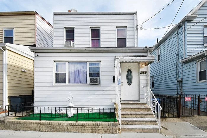 2 Family Home located near shops/transportation in the heart of Woodhaven. Featuring Solar Panels and a Basement with an Outside Separate Entrance. House has solar panel lease and will be transferred to new owner upon purchase of home. house is being sold as is condition