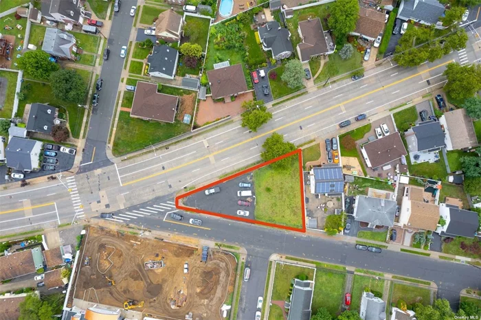 This parcel of land includes APPROVED plans and permits for 2800 SF Modular Home. Can also build commercial building--currently zoned for commercial. Great exposure. Premier High traffic location perfectly situated near public transportation, dining, recreation, shopping and schools.