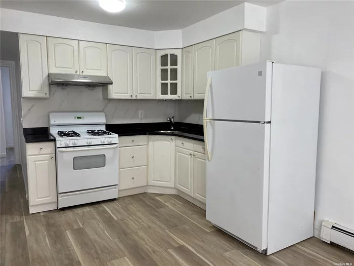 A newly renovated 2 Bedroom Apt in the Flushing/Fresh Meadow Border Area. The apt is bright and spacious with access to the backyard. Nice new kitchen and bathroom. All utilities included except for electric. Close to public transportation, shops, and many more!!!