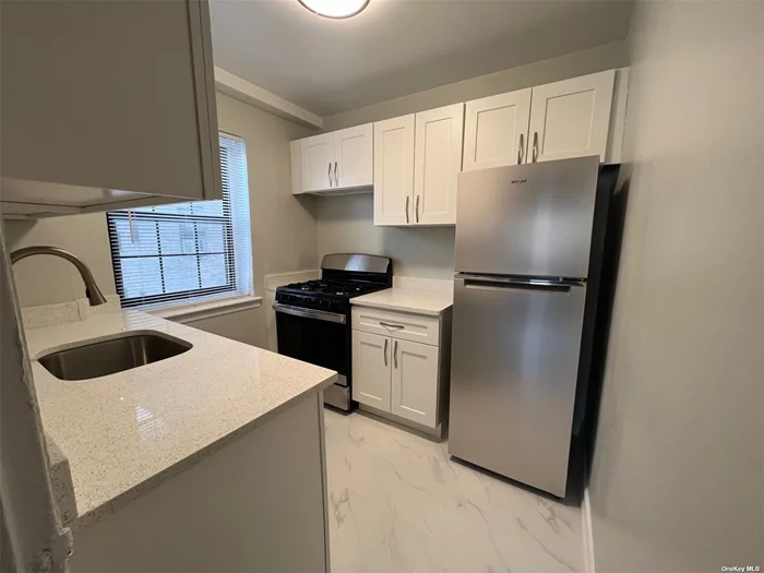 Beautiful 1 Bedroom Co-op In Kew Garden Hills On The 2nd Floor With Garden View. Very Large Living Room, Alot Of Windows, Large Closets, Dining Area,  Wood Floor Throughout, Brand New Kitchen With Stainless Steel Appliances. Low Maintenance Close To Shops & Transportation!