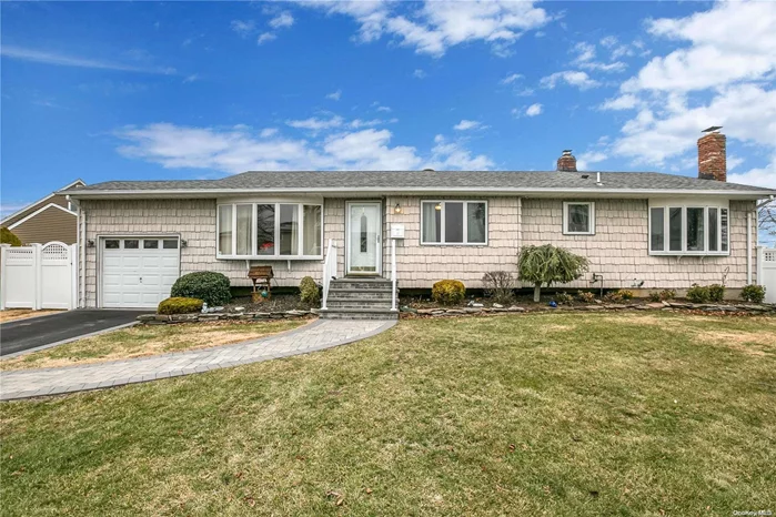 Mint+++ wideline Exp. Ranch situated on quiet block, cul-de-sac, great curb appeal w/ vinyl sided exterior, brand new driveway, brick paver walkway, stoop & steps. LR w/ refinished H/W floors, banquet FDR, updated EIK w/ oak cabinets, granite & S/S appliances. Side ext. lg MBR w/ WIC & MBR Fbth. Side ext. lg Family Rm w/ brick fpl, H/W floors, built-ins & sliding doors to patio. All windows have been replaced, interior raised panel doors, Laundry Rm w/ new washer & dryer, Peerless boiler 15 years old, 150 amp electric, 1 car attached garage w/ electric garage door opener. Privately fenced backyard, patio, 6 ft PVC fencing, IGS. Convenient to all transportation & shopping.