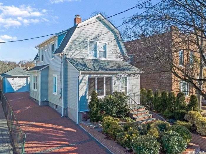 **Back On Market - Contract Fell through** **Commuters Dream** Welcome To This Conveniently Located 3 Bedroom, 1.5 Bath Open Concept Dutch Colonial Only A Short Distance To The LIRR Station (Port Washington Line)... This Natural Bright Property Features An Open Concept First Floor, Multiple Entrances, A Long Driveway w/Parking For Six Cars, A Big 1 Car Detached Garage with Great Backyard Space & So Much More... CLOSE TO ALL ...Minutes/Seconds Away From Port Washington Village, Port Washington Schools, Port Washington Docks, Golf Courses, Recreational Parks, Major Shopping, Food Centers, Mass Transportation (Long Island Rail Road) & Major Roadways such as Port Washington Blvd, Northern Blvd, Long Island Expwy, And Northern State Pkwy...This Is A Must See, Schedule A Tour Today!!!