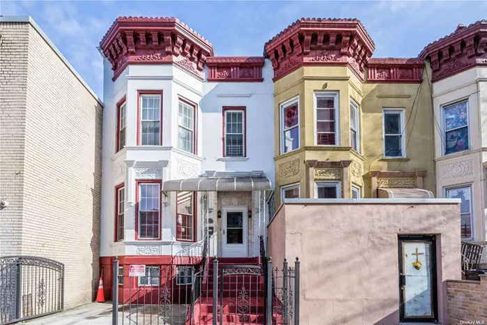 This beautiful 2-family Manhattan-style townhouse in an R7 Zoning District is a rare offering in a residential area of Jamaica, Queens. The gracious 1910-built home is in good condition and brimming with elegant prewar features. Airy 9&rsquo;5 ceilings, oversized room hardwood floors, large windows inviting in natural light. First floor has a living & dining room, 3 bedrooms, 1 full bath and a kitchen leading out to the backyard. Second floor is a perfect rental apartment that has an entry foyer, large windowed living room, formal dining room, full bath and 3 bedrooms lots of closets. Floors two and three also have skylights, and smaller rooms that can be used as walk-in closets. Full finished basement with a full bath with front and backyard exits, a spacious private backyard for barbecues, lounging and outdoor recreation. Rooms are generously-sized and comfortable for living and entertaining, with loads of closets, and great versatility for a home office, den, and media room.