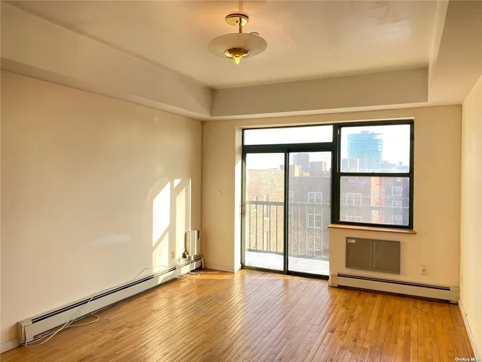 Excellent location. Minutes to the 7 train, LIRR and downtown Flushing. Close to major highways, bridges, airports and sports venues. Young building with doorman (7am-11pm) and laundry on site. High floor unit with plenty of natural sunlight. Southern exposure with open view. Very bright and sunny. 2BRs and 2 full baths. Hardwood floor. Granite countertop. Open kitchen. Tray ceilings. Master bath. Spacious balcony offers beautiful skyline in the backdrop. Great for own use or investment. Info deemed reliable but not guaranteed.