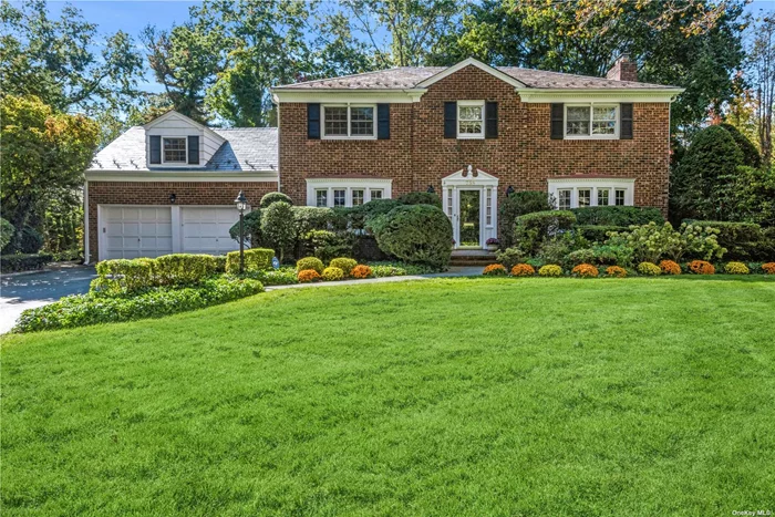 Classic Munsey Park Brick Center Hall Colonial offers 4 Bedrooms 3.5 Baths Including Guest Wing or Home Office Area.