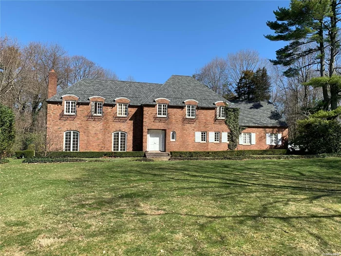 Incredible opportunity to bring back the original charm of this brick French Provincial style colonial. Sitting on two flat acres and abutting the Muttontown Country Club, this 4BR/2.5Bth home is a true diamond in the rough. Just 40 minutes to NYC. Close to restaurants and shops. Conveniently located. Low taxes. Locust Valley Schools. Sold As Is. Needs full renovation.