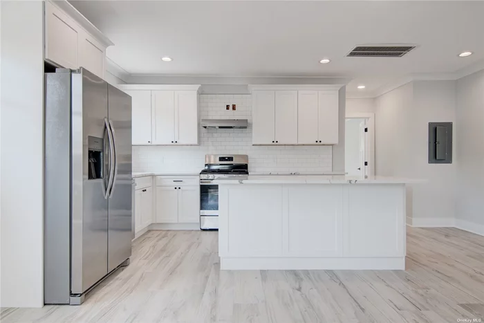 2 Bedroom Luxury Apartment with top notch finishes, brand new in the process of full renovation! Right off main street in Bay Shore prime location close to Shops, Food, Train, Hospital, Ferry. Utilities not included.