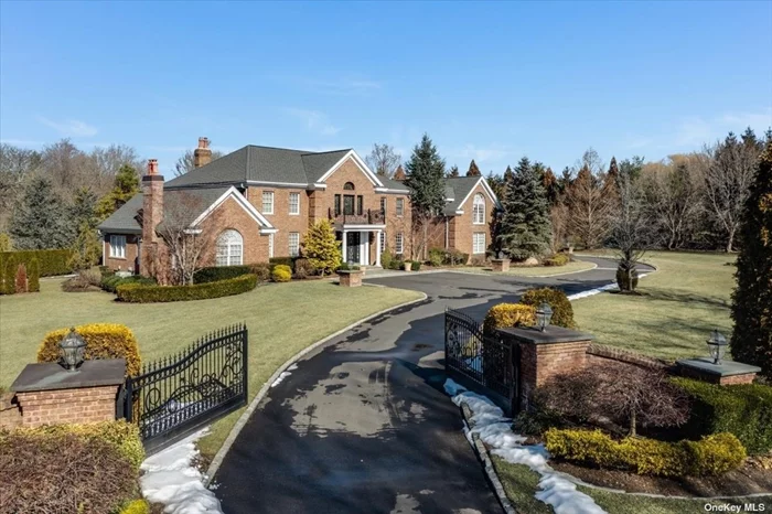 Retreat from the city to this EXCEPTIONAL young, Brick Colonial privately situated on 3.66 acres of lush property. Complete modern Renovation done in 2020 w/ no expense spared and every attention to detail. Luxurious amenities thru-out including: Grand 2-story entrance w/ custom handcrafted wrought iron staircase, DESIGNER gourmet eik with Wolf & SubZero appliances & radiant heated floors, luxurious well-appointed master bedroom suite w/high ceilings & radiant heated bathroom w/steam shower, & ALL en-suite bedrooms. Basement has 12ft ceilings & is the PERFECT indoor entertaining spot w/ glamorous Lamborghini bar w/ all the bells & whistles. The backyard is the perfect Summer spot for pool parties in this spectacular entertainers delight w/ a heated/saltwater Gunite pool, and pool house w/over 1200 sq ft complete w/ full kitchen, f/ bath w/ steam shower, br, entertaining area & laundry room. Pen Mor Farms At Muttontown Is A Private oasis--Perfect location just 25 Miles To NYC!!