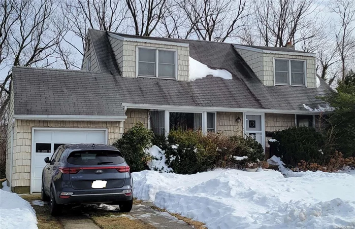 Cape home located in prime Syosset area 4 bedrooms 2 baths. Must see.