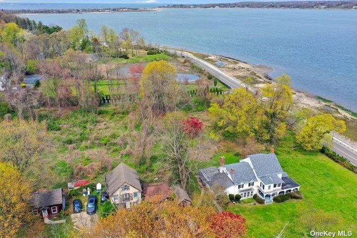 Waterviews of Oyster Bay Harbor! 5.4 acres with house, Carriage house & Cottage. Property being sold for land value. No access to house. Natural Gas and well water ( new water pump). Inc Village of Mill Neck- mooring rights.