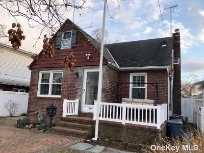 Welcome home to this cozy Tudor style cape !! In the heart of Bellmore.2 ductless air conditioning . Beautiful and Bright Family room extension. Beautiful Hardwood floors. 150 amp elect.3 good size bedrooms and a detached 1 car garage Near long Island Railroad Near all shops and houses of worship.