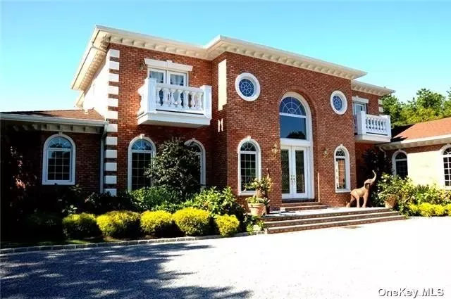 Privacy All Around on This Magnificent Brick Estate, Situated On 1.4 Ac. w/Manicured Grounds. Features A Grand Foyer, Oversized Doors & Windows, Gourmet Kitchen W/ Center Island, Full Bar for Entertaining, Formal Lr W/ Fp, Formal Dr, Den, Large Office w Addl Den,  Master Suite W/ Fp & Master Bath, Addl. Upper Level Loft Living Area, Stately Bedrooms W/ Balconies, 2 Laundry Rooms, Bluestone Patio, Outdoor Cooking, Putting Green, Ig Pool With 12X12 Spa & Waterfalls, Finished Basement with Movie Theater & Gym. Multi Zone Heating & CAC, Three Car Garage. Close to All East End Living Features inc. WHB Village, Dune Road Beaches, Golf Courses & East End Vineyards. Let the East End be Your Playground, and 9 Kate Court be Your Sanctuary.