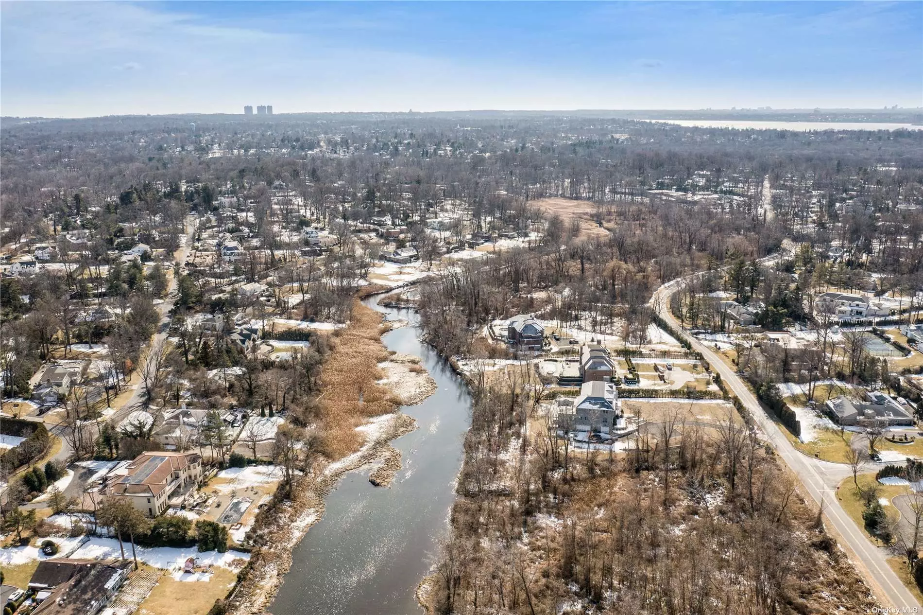 Custom build your dream home on this beautiful 4.07+ Acre lot in the heart of the esteemed Village of Kings Point. Flat, private property with scenic views of Mitchell Creek.