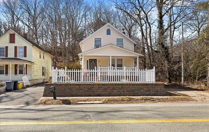 Amazing Opportunity in Woodbury! 3 Bedroom & 2 Full Bath Colonial with front porch. Hardwood floors. Living Room, Dining Room with open flow floor plan. Kitchen with white cabinets, granite and stainless steel appliances. 3 Bedrooms upstairs with full bath. Full basement with laundry. Possible special use with proper permits and approval. Walt Whitman Elementary, Syosset Schools.