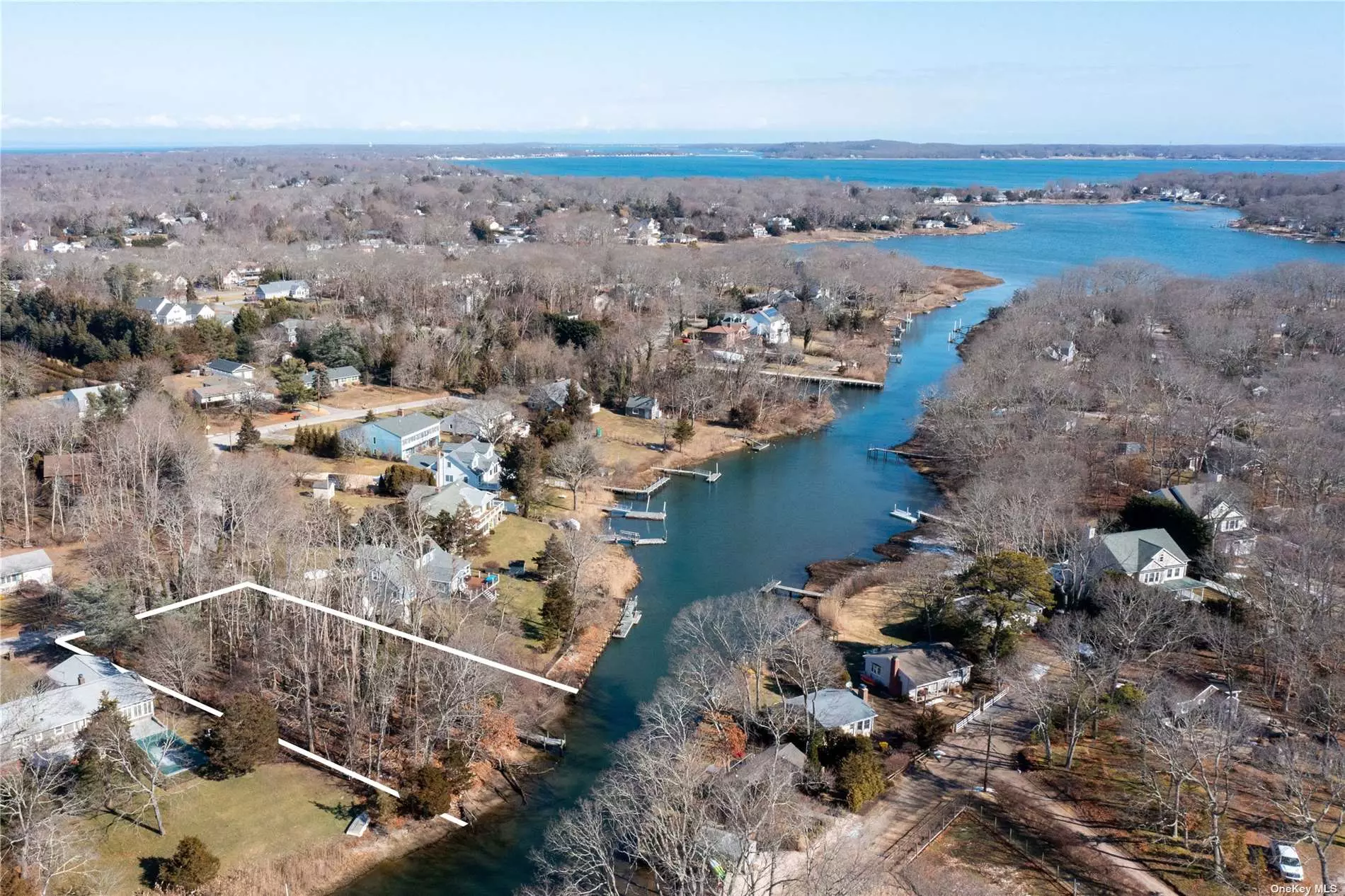 Wonderful opportunity to build your dream home on this level lot with 30 foot dock in place. Original Trustee and DEC and Bldg Dept. permits and approvals now expired for previous proposed build of large home with 2-car garage and full basement. Most of site zone X, no Flood Insurance req&rsquo;d. Please do not walk the property without appointment.