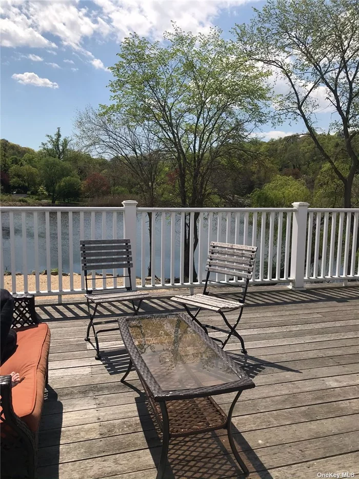 Roslyn. Beautifully Renovated 2 Bedroom/1 Bath Apartment With Water Views From A Huge Deck. Renovated Kitchen and Bath. Washer/Dryer in Unit. Hardwood Floors Through-out. CAC. Off-Street Parking! In Very Close Proximity To Town, Parks, Shopping and Transportation