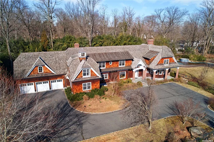 NANTUCKET STYLE RESIDENCE ON OLD HOUSE LANE Over 8, 800 square feet of open 3 level living space throughout. Sun drenched expansive rooms on the first level all leading out to the garden courtyard and pool. Massive great room with soaring ceilings make for an ideal place to entertain and host gatherings. Two winged primary en suites, marble bathrooms, jacuzzi, separate shower and walk-in closets. Lower level with access to private yard, in home movie theatre, sports wet bar, in home full gym, separate recreation room, full bathroom and a huge living space. Attached 3 car garage with 4 bays, built-in bbq area and in ground pool.