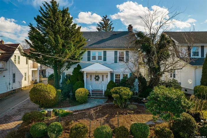 A commuters dream! Conveniently located close to town, train, school. Mid-block location in the heart of Manhasset. Recently updated in 2018. This beautiful center hall colonial 3 bedrooms, 2.5 baths, offers great living space with easy floor plan. South facing spacious and sun drenched dining room/ family room with large windows, 3 skylights and sliding glass doors that leads to covered patio and lovely property.