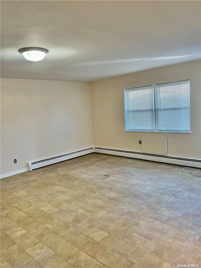 Beautiful cozy studio in a quiet, safe neighborhood of Fresh Meadows. Ground Floor with 2 separate entrances in Brick House. Close to public transportation, Q17 and Q88 express bus right in front of home, 5 minutes to major highways. Hardwood Floors, Full Bathroom, and Kitchen. Beautiful fenced in private backyard. No pets allowed. Tenant pays Electric.