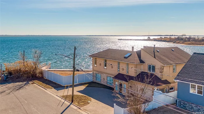 A boater&rsquo;s dream house awaits you! This beautiful bayfront Colonial overlooking The Great South Bay is perfectly situated in a cul-de-sac. Magnificent water views, 5/6 bedrooms, 3 full baths, large EIK with granite countertops, and stainless steel appliances. Breathtaking water views from a second-floor balcony. Sliding doors to the deck along with backyard docking for jet skis. Private stone driveway with parking for 4 cars. Central air and gas heat. Studio or home office with full bath & private entrance. Low Taxes! 100 Ft Bulkhead/Dock & Mooring, A must-see!